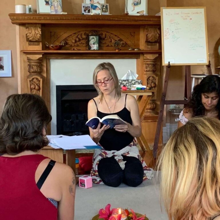 Tami Lynn Kent teaching Holistic Pelvic Care™ for Providers workshop, sharing her knowledge and experience with a group of attentive participants